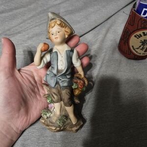 Charming Figurine with Blue and Brown Accents